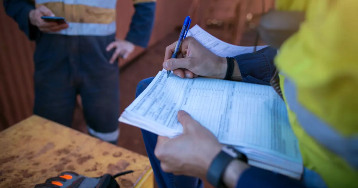 Los Angeles contractor reviewing CA plumbing permit documents