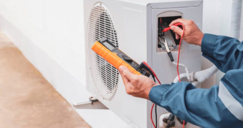 Energy Efficient AC Tune Up Los Angeles Homes 1 Los Angeles energy efficient AC tune up technician working